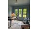 Comfortable office space featuring neutral walls, natural light, and stylish décor at 1807 Arnold Dr, Charlotte, NC 28205