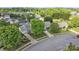 An aerial view captures the home's location within a neighborhood dotted with mature trees at 2008 Taras Trace Dr, Statesville, NC 28625