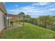 A cozy backyard with a pergola-covered patio, ideal for outdoor relaxing and dining at 2008 Taras Trace Dr, Statesville, NC 28625