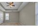 Bedroom featuring neutral walls, plush carpeting, natural light from a window, and ceiling fan at 2008 Taras Trace Dr, Statesville, NC 28625