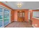 Cozy dining area with natural light from sliding doors, and hardwood flooring at 2008 Taras Trace Dr, Statesville, NC 28625