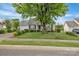 Charming single-story home with blue shutters, a well-manicured lawn, and mature landscaping at 2008 Taras Trace Dr, Statesville, NC 28625