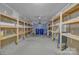 Spacious garage interior provides ample room for storage and organization with shelving at 2008 Taras Trace Dr, Statesville, NC 28625