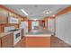 Open kitchen featuring modern appliances, breakfast bar, and plenty of cabinet storage at 2008 Taras Trace Dr, Statesville, NC 28625