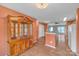 Open-concept living space with hardwood floors leading to kitchen and dining area at 2008 Taras Trace Dr, Statesville, NC 28625