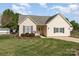 Lovely single-story home showcasing a manicured lawn and charming curb appeal at 206 Summey Barker Dr, Dallas, NC 28034