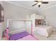 Bright bedroom featuring a bunk bed, gymnastic bar, and light-colored walls with natural light at 209 Helton Ln, Fort Mill, SC 29708