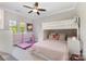 Cozy bedroom featuring a bunk bed, gymnastic bar, and light-colored walls with natural light at 209 Helton Ln, Fort Mill, SC 29708