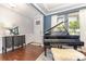 Stylish living room with hardwood floors, a grand piano, and elegant console table with accent mirror at 209 Helton Ln, Fort Mill, SC 29708
