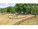 Community playground with swings, slides and climbing structures at 209 Helton Ln, Fort Mill, SC 29708