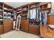 Large walk-in closet with wood shelving, drawers, and ample storage space at 209 Helton Ln, Fort Mill, SC 29708
