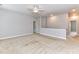 Spacious loft area features neutral walls, carpet flooring, and a ceiling fan for added comfort at 2369 Baxter Se Pl, Concord, NC 28025