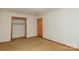 Bedroom featuring carpeted floors, a closet, and electrical outlets at 2412 Wedgewood Dr, Salisbury, NC 28146