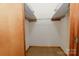 Walk-in closet featuring carpet floors and shelving at 2412 Wedgewood Dr, Salisbury, NC 28146