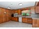 Spacious kitchen with wood paneling, lots of cabinets, and modern appliances at 2412 Wedgewood Dr, Salisbury, NC 28146