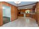 Eat-in kitchen featuring wood cabinets and tile flooring at 2412 Wedgewood Dr, Salisbury, NC 28146