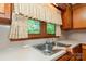Close-up of a kitchen sink with a window, offering a view of the outdoors at 2412 Wedgewood Dr, Salisbury, NC 28146