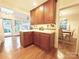 Bright kitchen showcasing hardwood floors, and easy access to dining and the backyard at 3020 Hampton Ave, Charlotte, NC 28207