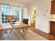 Bright office with natural light, vintage desk, and hardwood floors, ideal for a home workspace at 3020 Hampton Ave, Charlotte, NC 28207