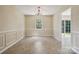 Open dining room offers stylish chair rail detail and space for entertaining at 3038 Twin Peaks Ct, Monroe, NC 28110