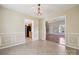 Inviting dining room adjacent to the kitchen features open layout and neutral decor at 3038 Twin Peaks Ct, Monroe, NC 28110