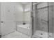 Bathroom boasts a soaking tub and glass-enclosed shower at 329 Brambling Ct, Monroe, NC 28110