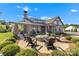New construction featuring a community fire pit with comfortable seating, perfect for outdoor gatherings and enjoying the fresh air at 329 Brambling Ct, Monroe, NC 28110