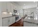 Modern kitchen with stainless steel appliances, granite countertops, and breakfast nook at 329 Brambling Ct, Monroe, NC 28110