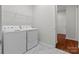 Laundry room featuring modern washer and dryer units at 329 Brambling Ct, Monroe, NC 28110