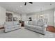 Spacious open-concept living area connecting the kitchen, dining, and living spaces at 329 Brambling Ct, Monroe, NC 28110