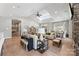 Spacious clubhouse living room with high ceilings, a fireplace, and dining and seating areas at 329 Brambling Ct, Wesley Chapel, NC 28110