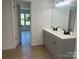 Well-lit bathroom featuring double sinks and stylish fixtures at 353 Quail Pointe Dr, Salisbury, NC 28147