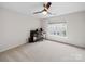 Neutral bedroom with carpet, a ceiling fan, and a window to let in the sunlight at 404 Basingdon Ct, Waxhaw, NC 28173