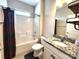 Full bathroom with granite countertop and shower and tub at 413 Hunton Forest Dr, Concord, NC 28027