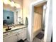 This bathroom offers great vanity space, modern lighting, and convenient access to the shower and toilet at 413 Hunton Forest Dr, Concord, NC 28027