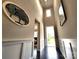 Inviting hallway with hardwood floors, decorative wall art, and high ceilings at 413 Hunton Forest Dr, Concord, NC 28027