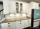 Elegant kitchen featuring white cabinets, granite countertops, subway tile backsplash and stainless steel appliances at 413 Hunton Forest Dr, Concord, NC 28027