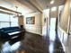 Inviting living room showcasing hardwood floors, natural light, and stylish decor, perfect for relaxation and entertaining at 413 Hunton Forest Dr, Concord, NC 28027