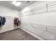 Large walk-in closet with plenty of shelving at 413 Hunton Forest Dr, Concord, NC 28027