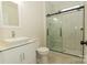 Modern bathroom with tiled shower and stylish vanity at 4410 Laurel Twig Ct, Charlotte, NC 28215