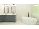 Bathroom features a soaking tub, double vanity, modern fixtures, and beautiful white tile at 4410 Laurel Twig Ct, Charlotte, NC 28215