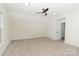 Spacious bedroom with plush carpet and multiple closets at 4410 Laurel Twig Ct, Charlotte, NC 28215