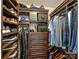 Spacious walk-in closet featuring custom built-ins and ample storage for clothing and accessories at 4625 Piedmont Row Dr # 701, Charlotte, NC 28210