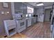 Well-lit kitchen featuring bright appliances, functional layout, and ample storage at 515 Upper Spencer Mountain Rd, Stanley, NC 28164