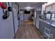 Functional kitchen featuring laminate floors, neutral cabinets, and standard appliances at 515 Upper Spencer Mountain Rd, Stanley, NC 28164