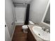 Bathroom featuring a shower/tub combo, vanity, and modern toilet at 544 Bentley Rd, Shelby, NC 28152