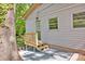 Side view of home entrance with a small wooden deck at 612 Summerow Rd # Lot 22, Stanley, NC 28164