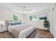 A styled bedroom with a large bed, bright windows and decor at 612 Summerow Rd # Lot 22, Stanley, NC 28164
