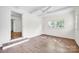 Bright bedroom with plank flooring, ceiling fan, and a view to the hallway at 612 Summerow Rd # Lot 22, Stanley, NC 28164