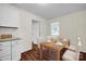 Bright kitchen/dining area with updated cabinetry, stylish flooring, and a comfortable space for meals at 612 Summerow Rd # Lot 22, Stanley, NC 28164
